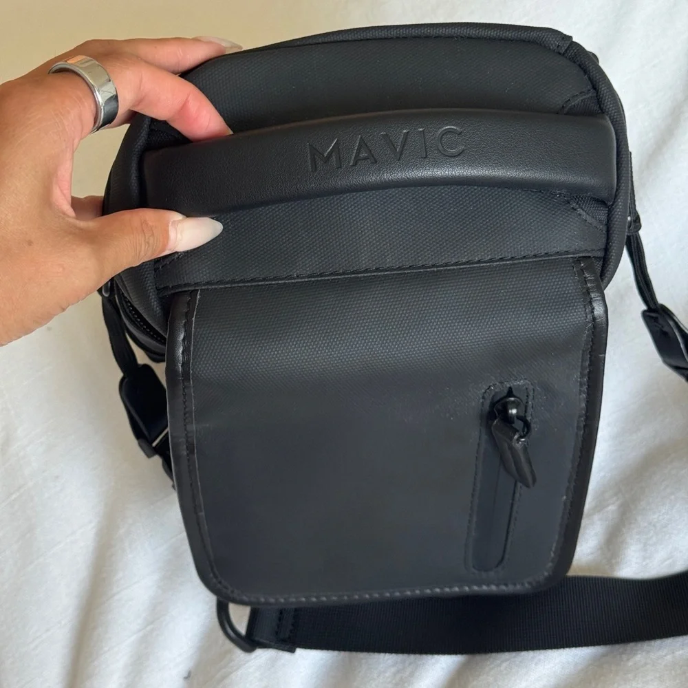 DJI Mavic Black Messenger Bag with Adjustable Strap and Minimalist Design